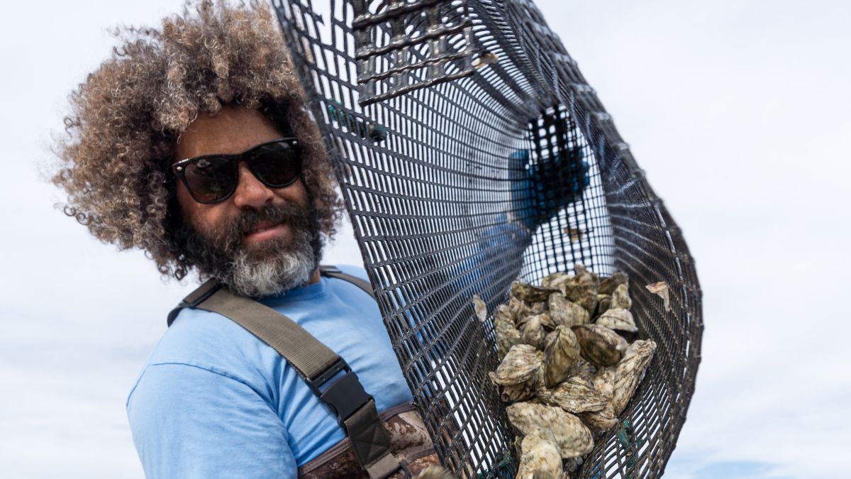 Ryan Bethea of Oysters Carolina empties a bag full of tasty oysters from his farm.