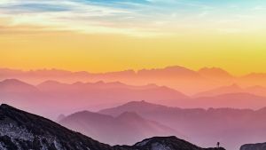 A mountain range at sunset