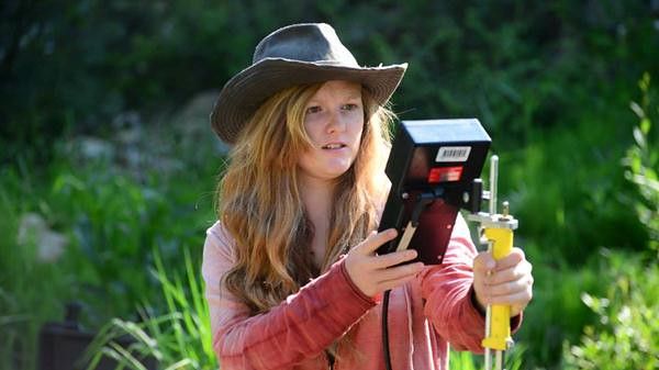 Photo credit: Bureau of Land Management, Utah. Teenage student uses technology to learn about soil and hydrology near Ephraim, Utah. Photo credit: BLM Utah
