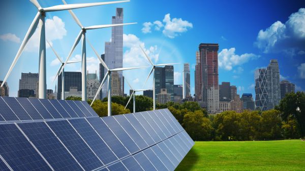 Climate Change Ed city in background with solar panels and windmills