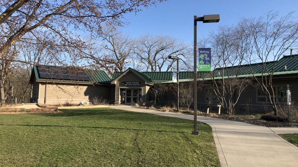 Anita Purves Nature Center The entrance to Anita Purves Nature Center, where solar panels sit atop the building.