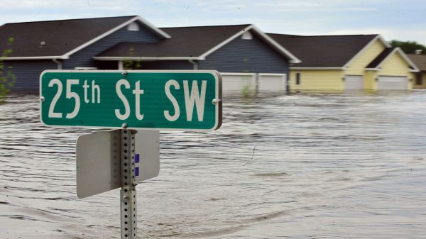 Flooded residential neighborhood in Minot, ND Climate Visuals - Flooding in Minot, ND