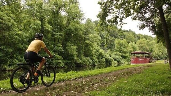 Person bicycling on historic trail