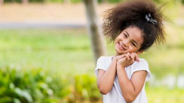 little girl smiling at camera 