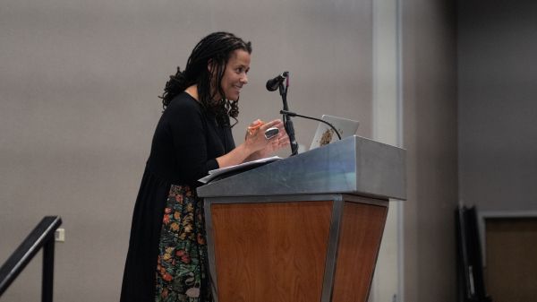 Dr. Carolyn Finney at a Podium