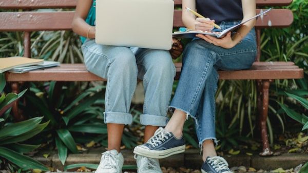 Two Women Studying Together