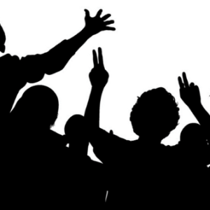 Silhouettes of group cheering with the Making Moves logo