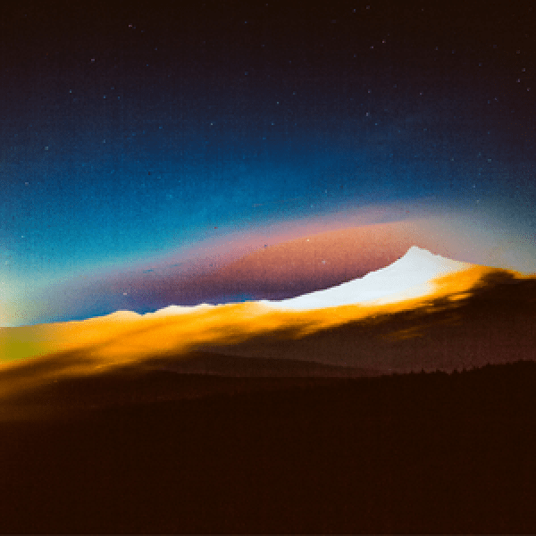 Abstract illustration of a mountain range with a bright light shining from the left